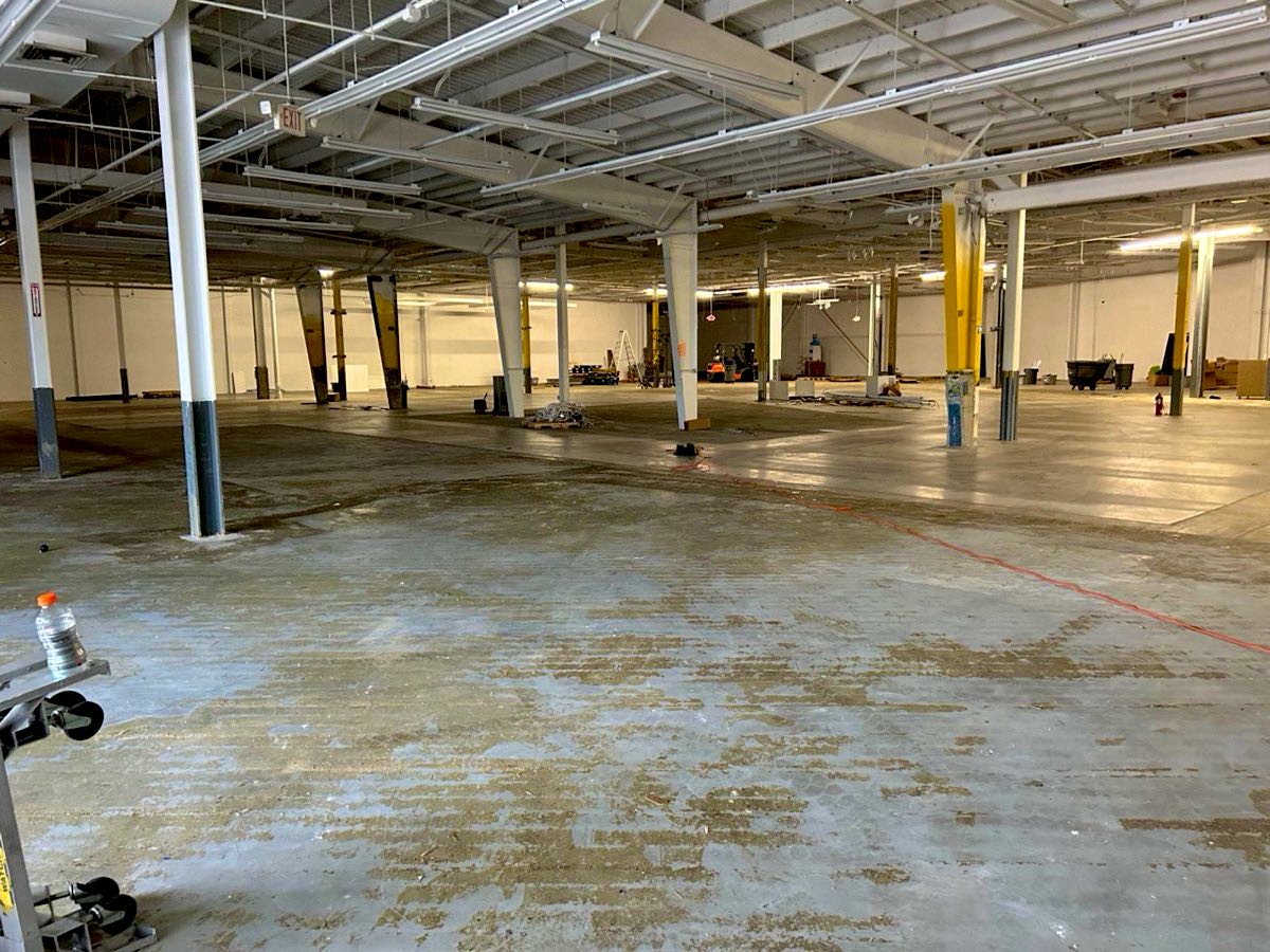 Empty Bed Bath & Beyond store floor in Dedham, MA after cleanout by LPC Removal Service