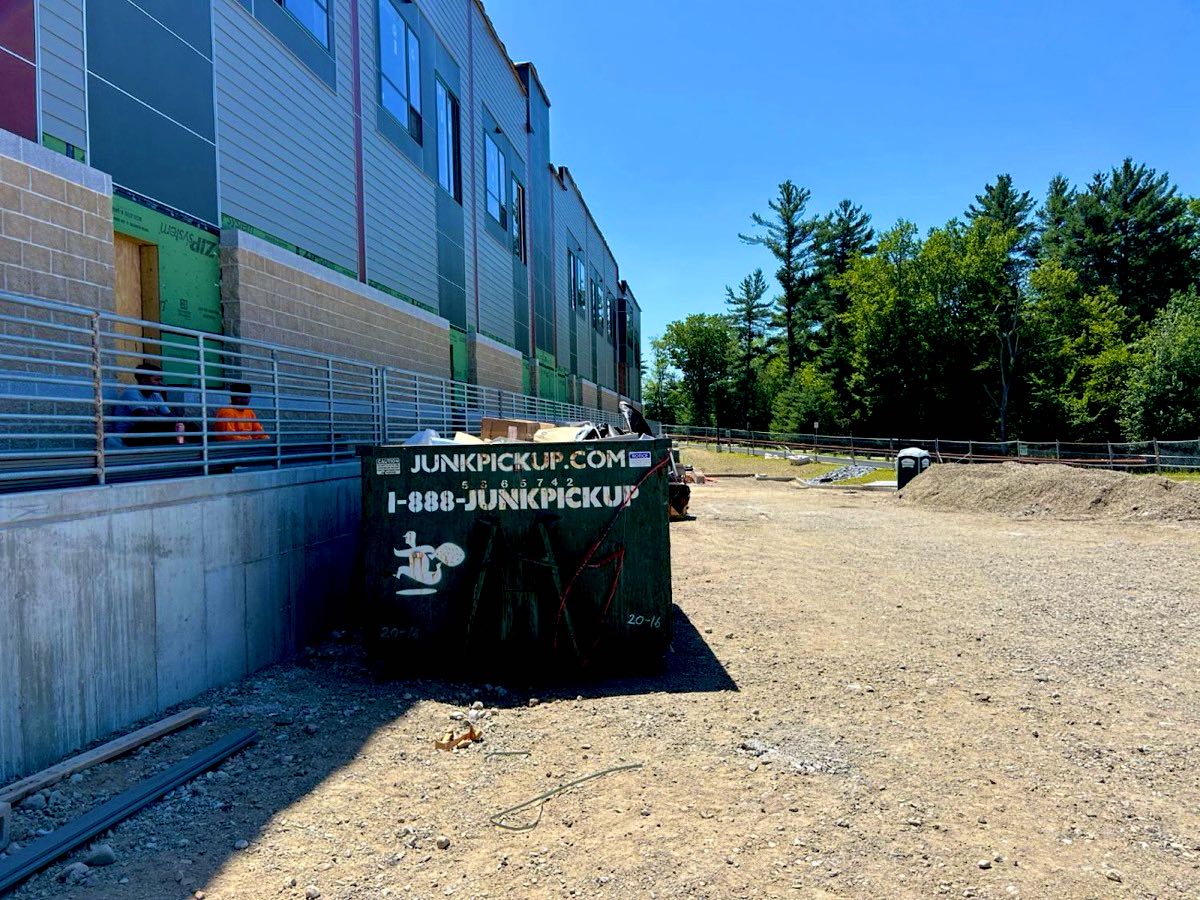 JunkPickup.com 20 yard roll-off dumpster at the Sharon Commons construction site in Sharon, MA