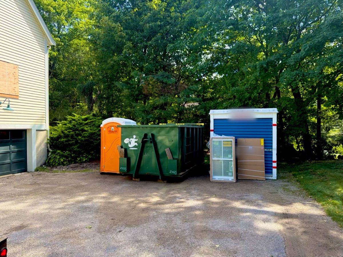 20 yard JunkPickup.com roll-off dumpster delivered for a contractor's home renovation in Walpole, MA